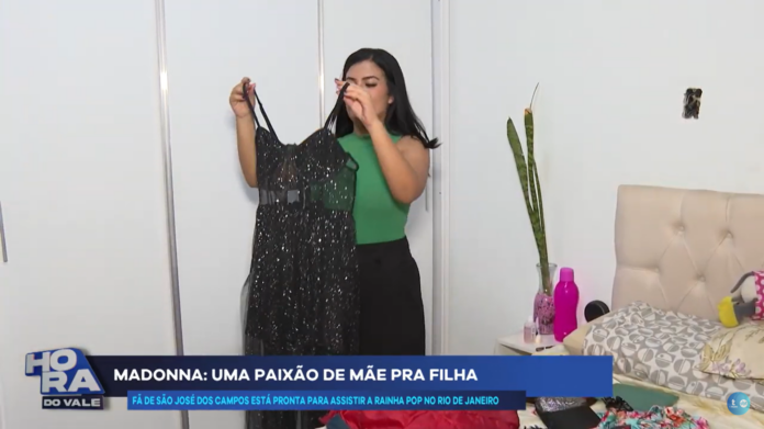 Fã de Madona se prepara para assistir show da rainha do pop Fã de Madona se prepara para assistir show da rainha do pop