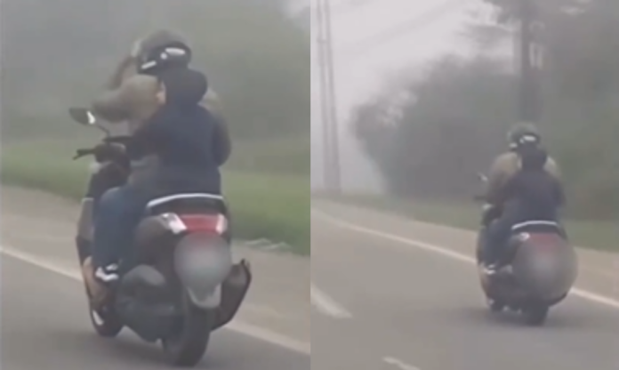 criança em garupa sem capacete